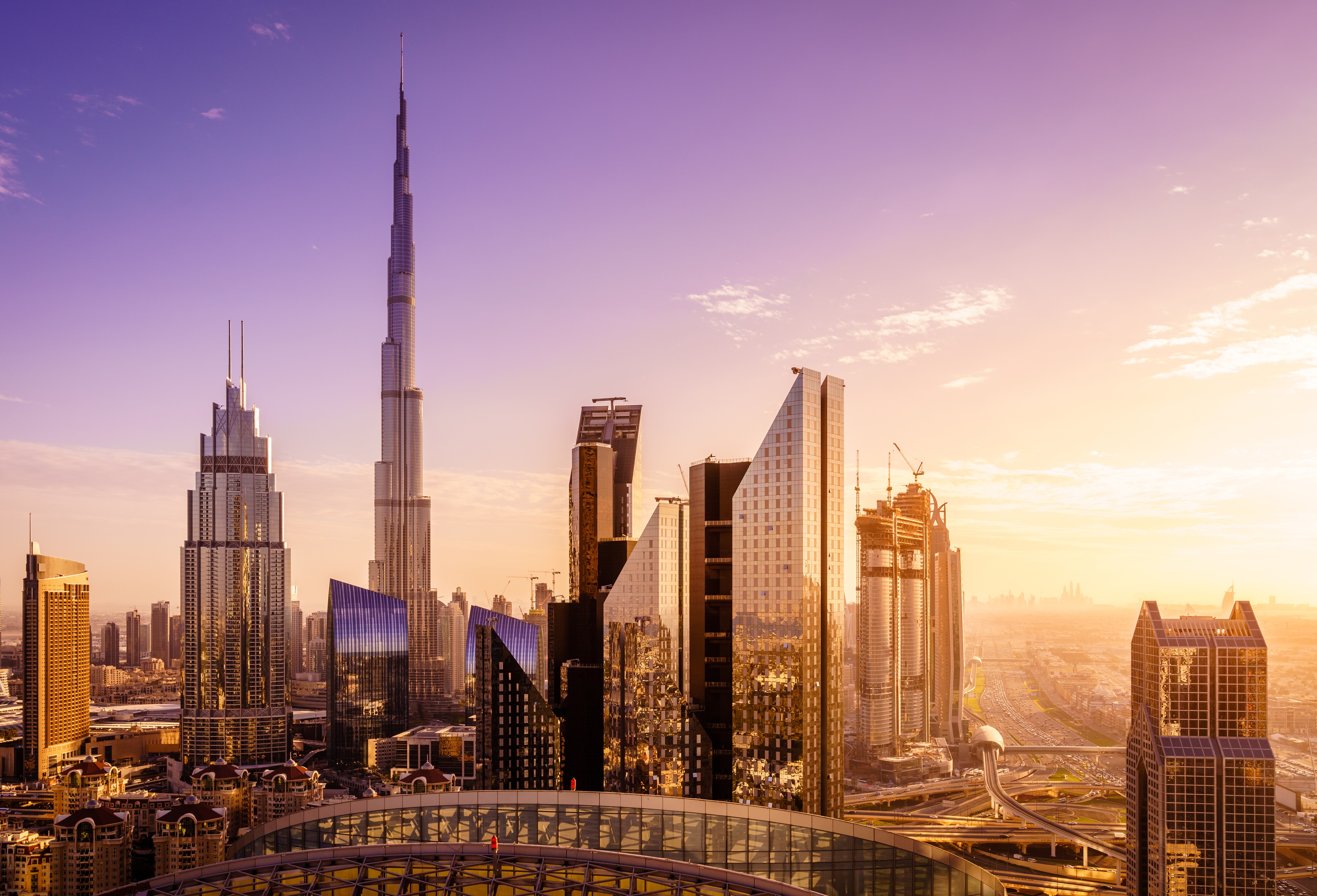 Dubai skyline with Burj Khalifa at sunset